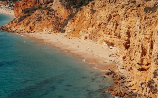 Aerial view of Algarve coastline promoting tourism