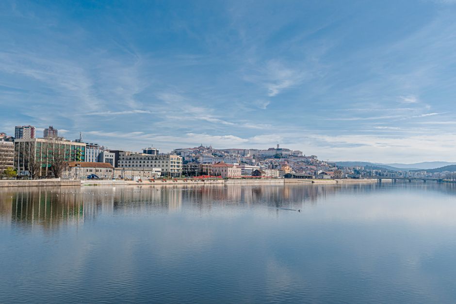 Mondego River flowing through Portuguese countryside near Coimbra