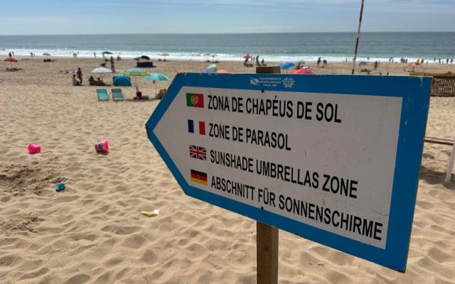 Sun blazing over a Portuguese coastal town in summer heat