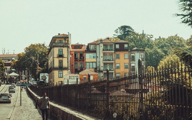 Walkers touring a low-income neighborhood on Porto's outskirts