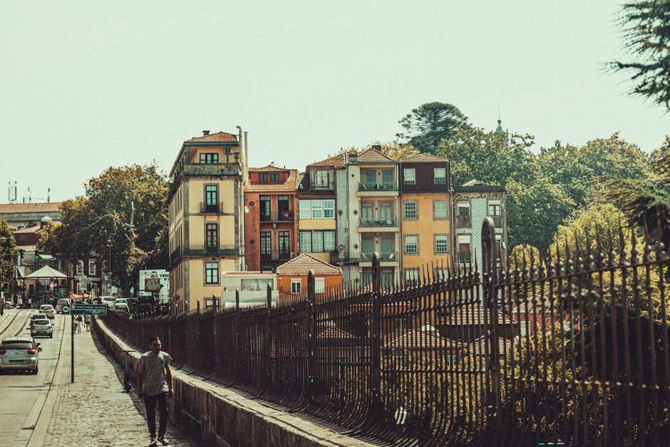 Walkers touring a low-income neighborhood on Porto's outskirts