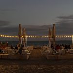 Outdoor terrace dining area with vertical garden in Lisbon