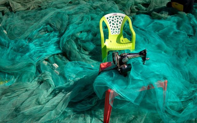 Discarded fishing nets piled at an Algarve port for recycling