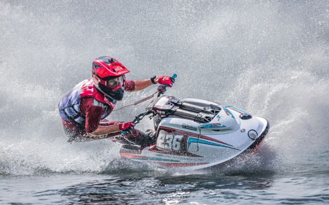 Jet ski racers competing at Barrinha da Praia lagoon in Mira