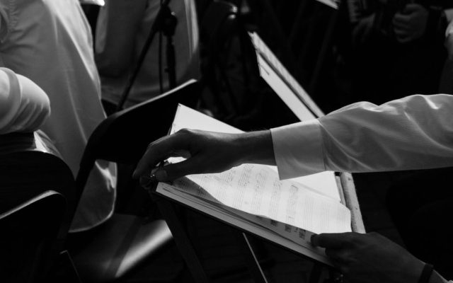 Young musicians and dancers rehearsing together in a studio
