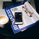 Person viewing financial investment content on a smartphone