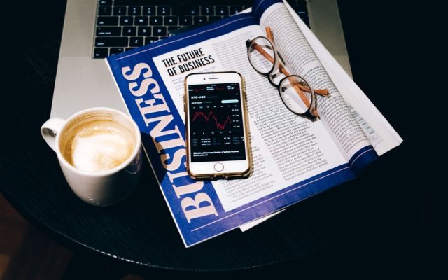 Person viewing financial investment content on a smartphone