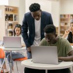 Students using laptops in a Portuguese classroom