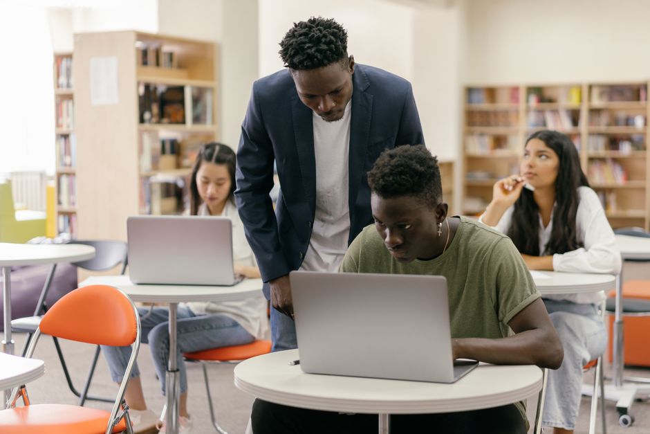 Students using laptops in a Portuguese classroom